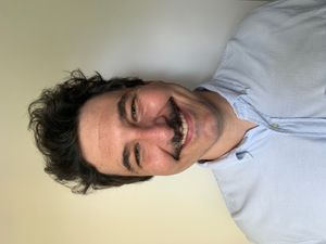 Chris Igidbashian, Therapist